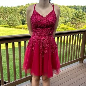 Formal burgundy dress.